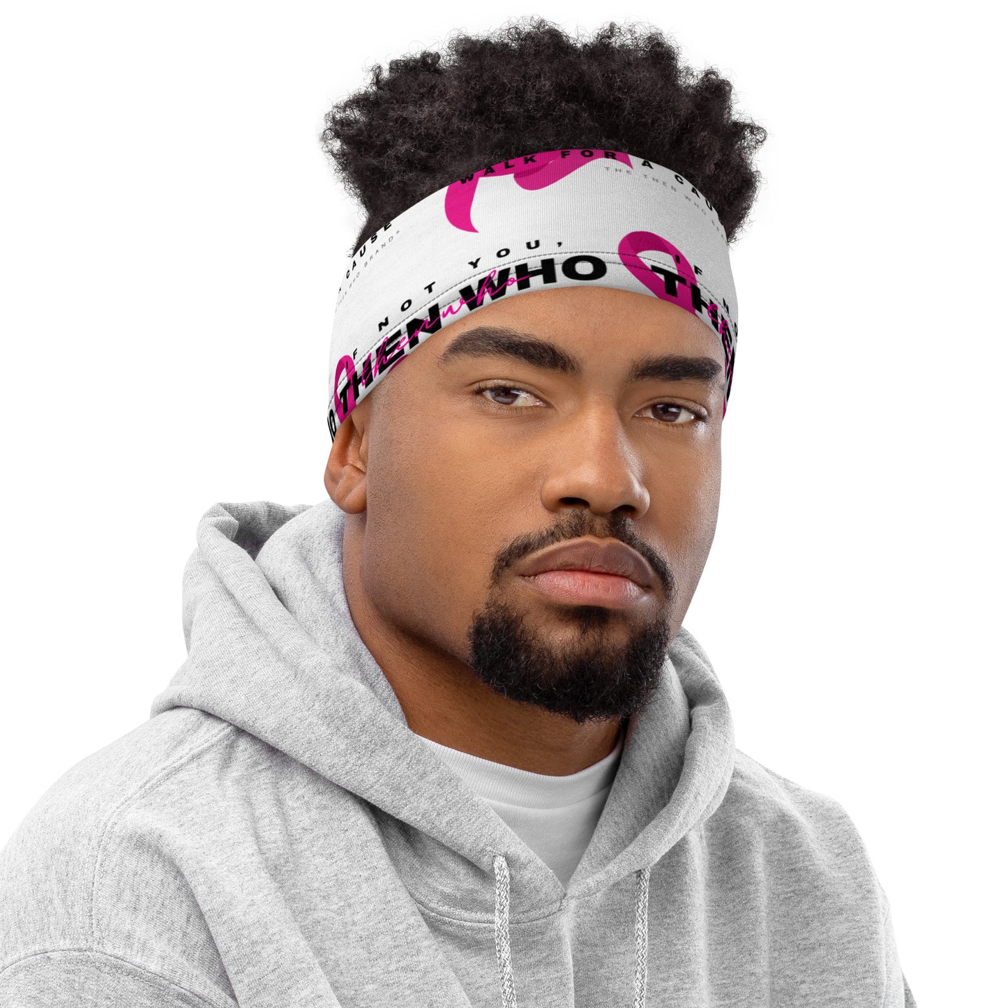 Man wearing a headband with text and a gray hoodie on a white background