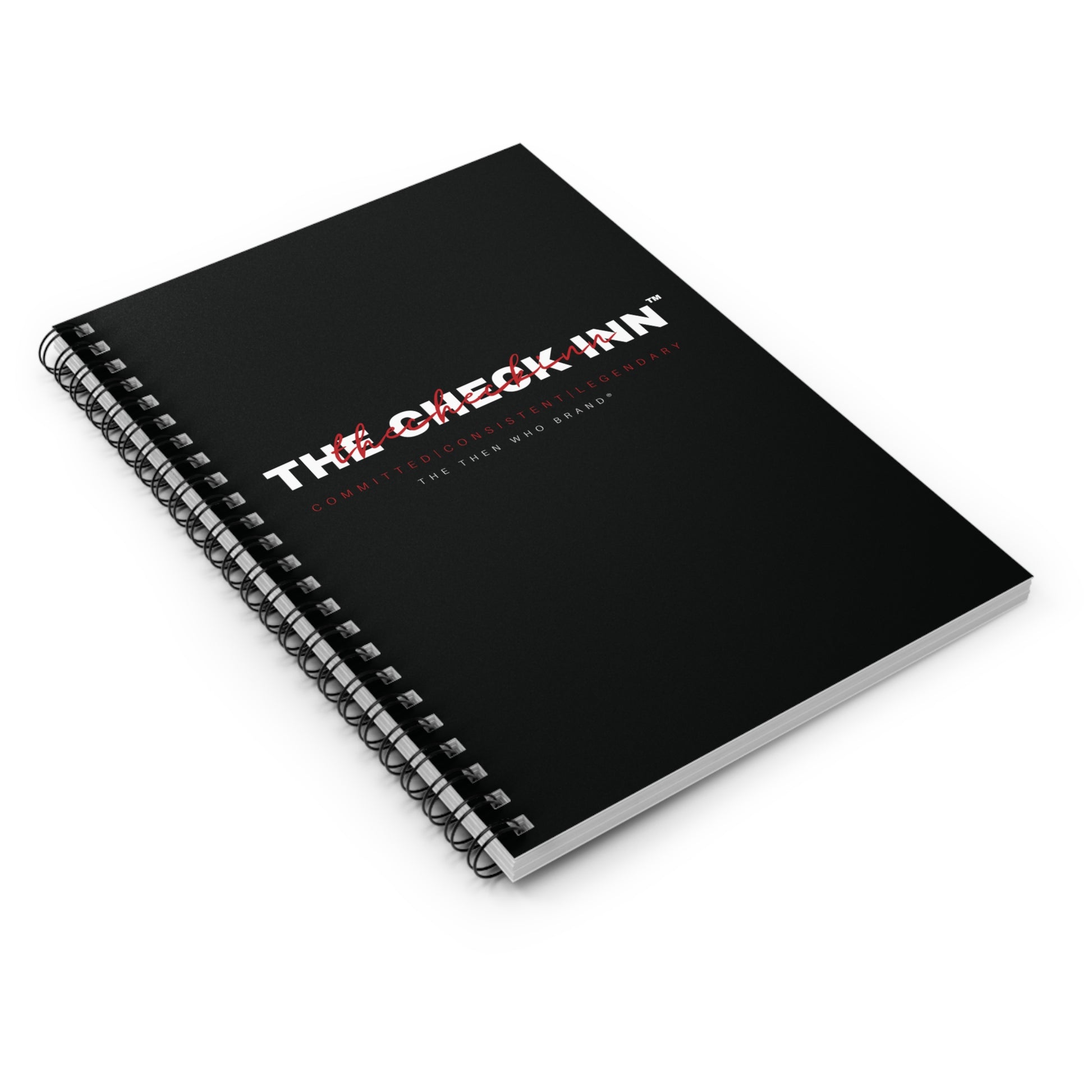 Black notebook with 'The Check Inn' logo on a white background