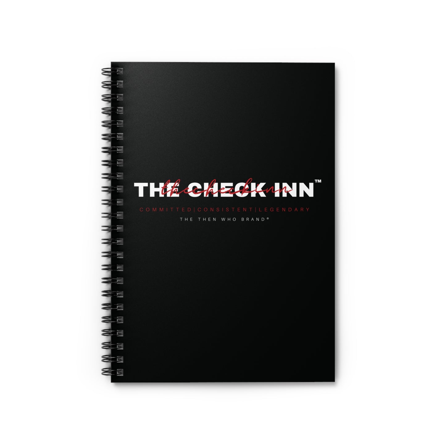 Black notebook with 'The Check Inn' branding on a white background