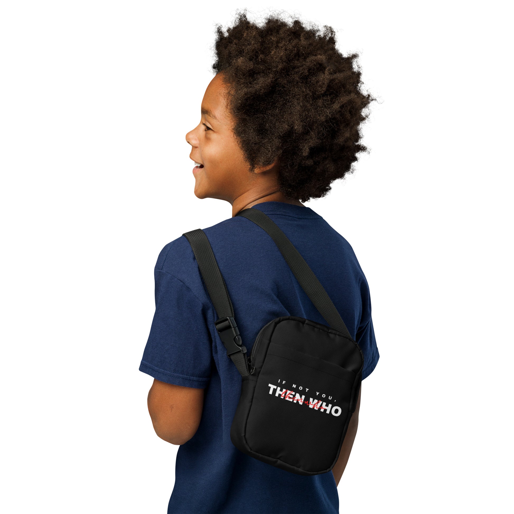 Child wearing a black crossbody bag with text on a white background