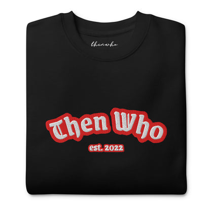 Black sweatshirt with 'Then Who est. 2022' text in red and white on a white background
