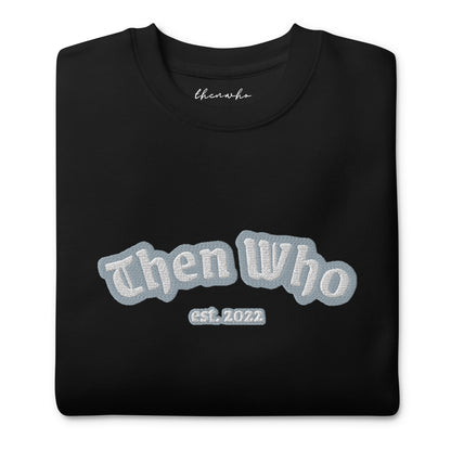 Black sweatshirt with 'Then Who' text and logo on a white background